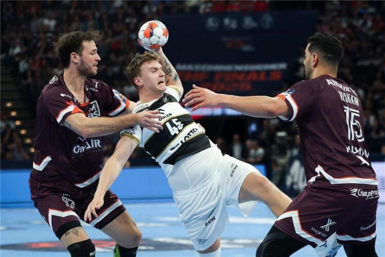 Montpellier Handball Triumphantly Lifts the Coupe de France Trophy Above La Comédie Montpellier Handball Triumphantly Lifts the Coupe de France Trophy Above La Comédie