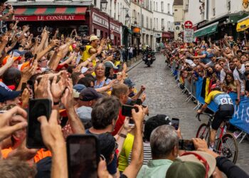 Rain Halts Final Stage of Tour de France, Leaving Overall Standings Locked with 50 km to Go